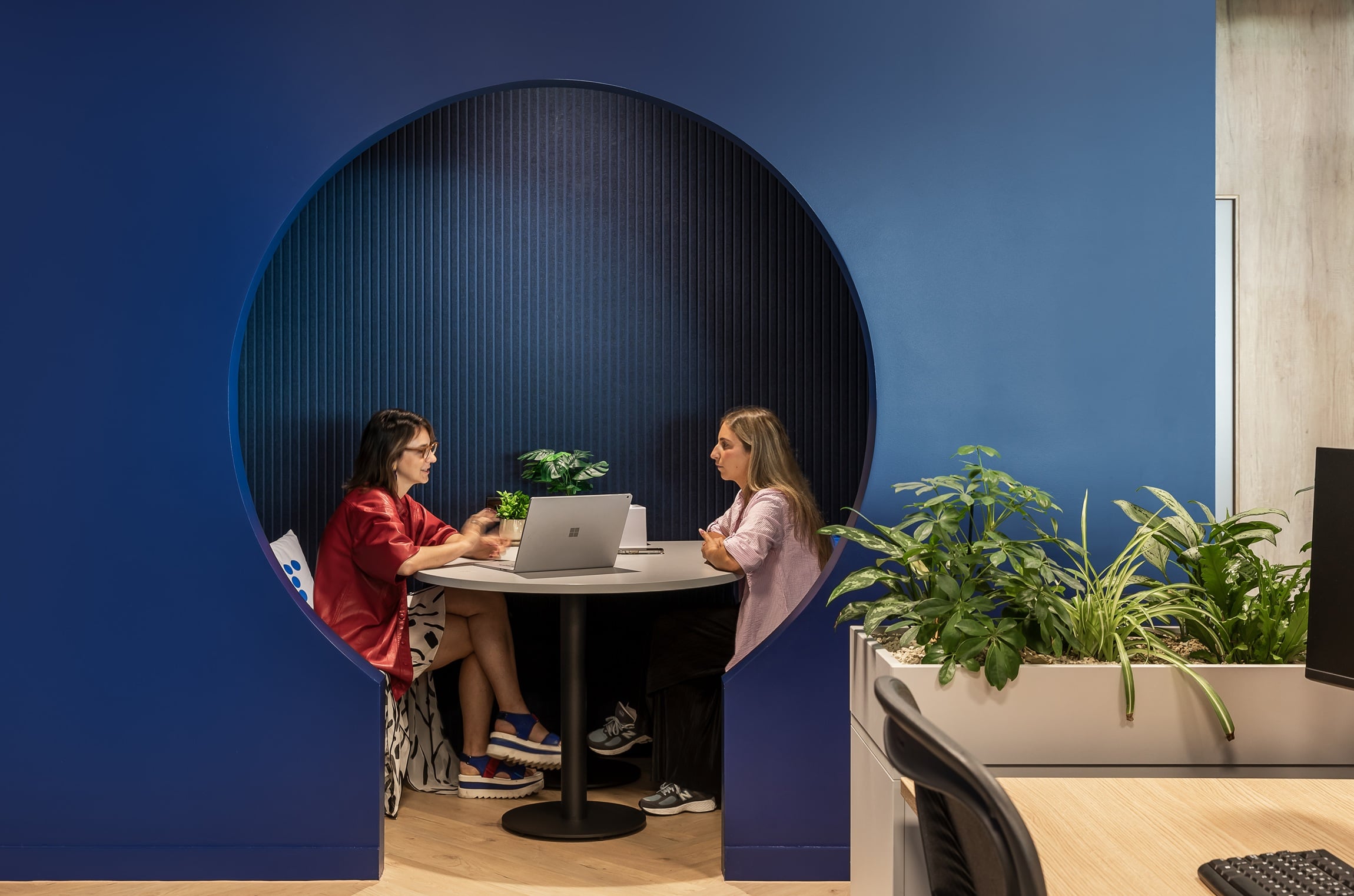 Two staff discuss what's the difference between agentic AI and other types of AI?