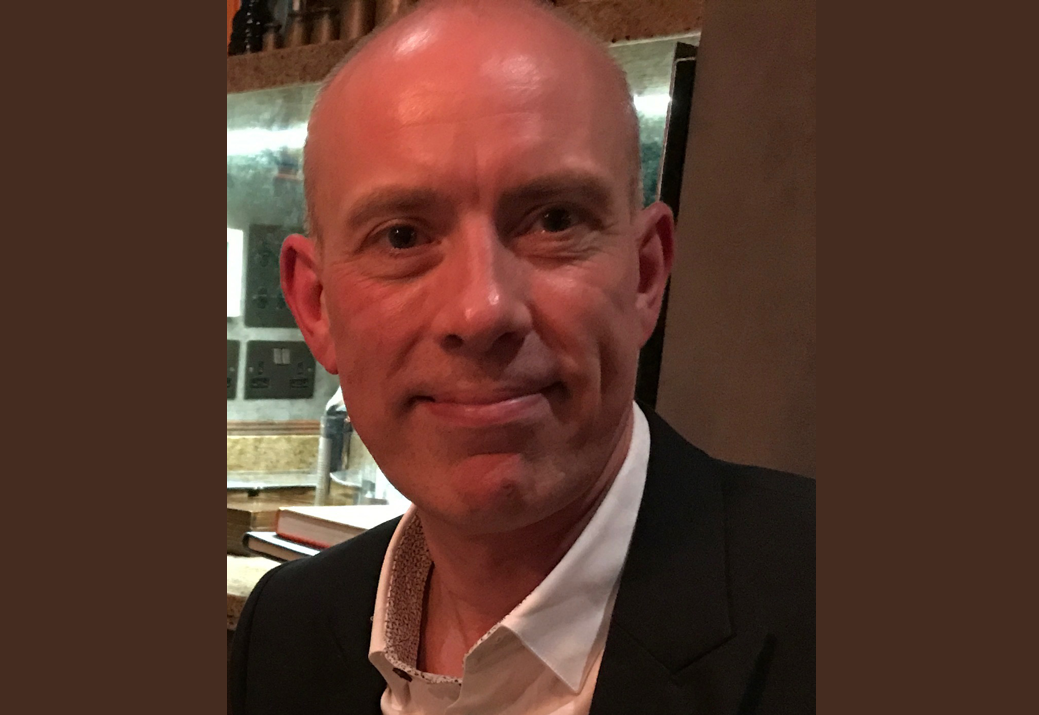 Professional headshot of Andy Clough.