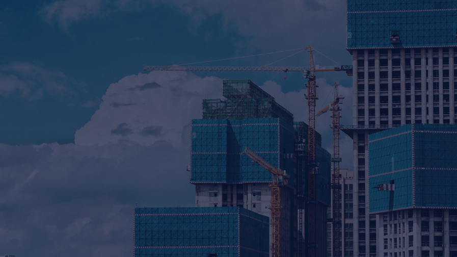 The image shows the construction of some high rise buildings