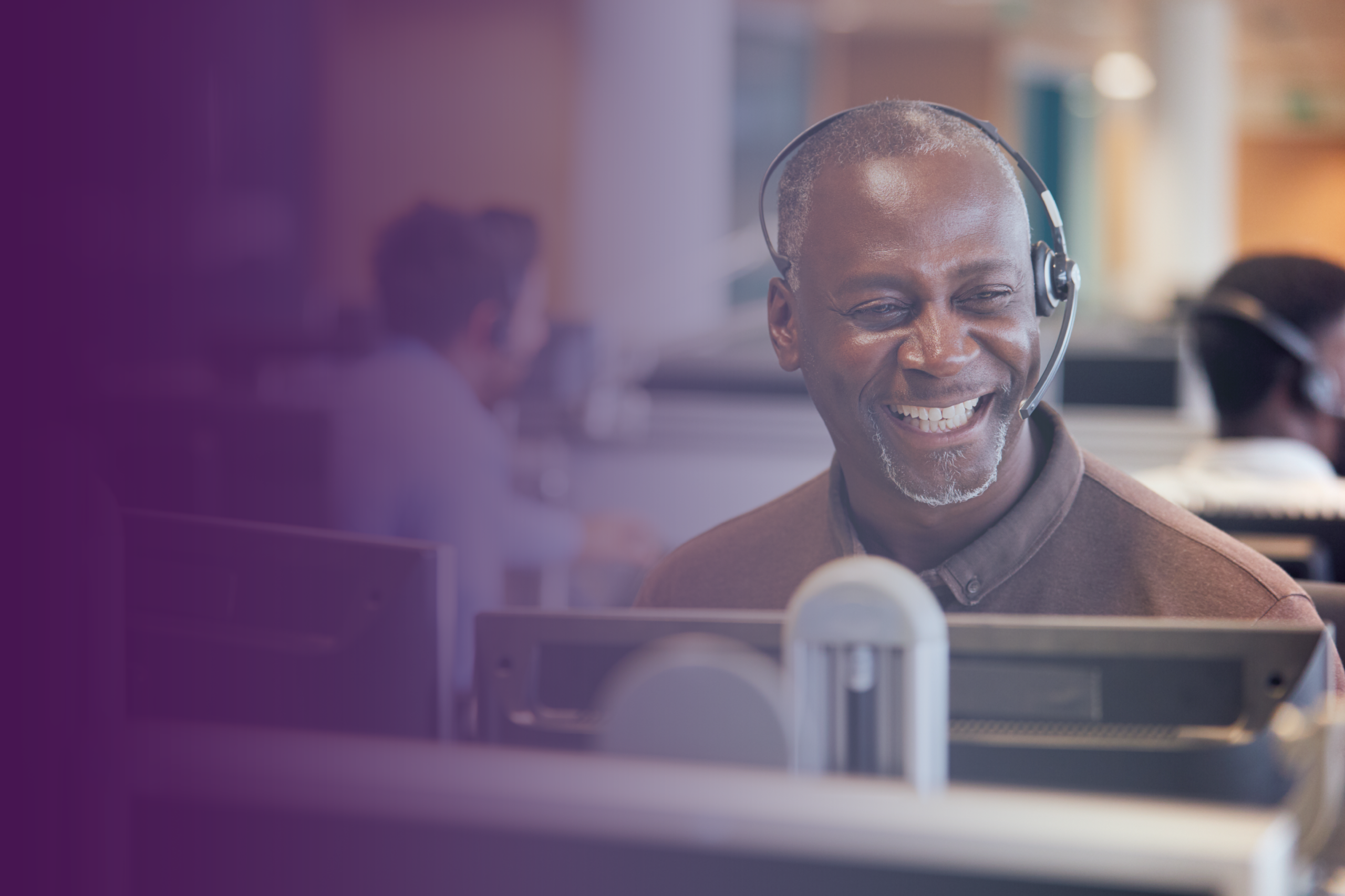 Customer contact centre agents using digital communication tools to manage customer interactions across multiple channels.