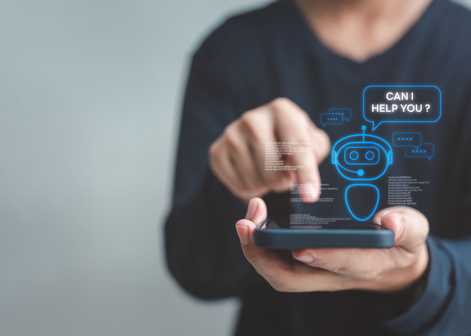 Man pressing on phone with robot saying data and ai solutions.