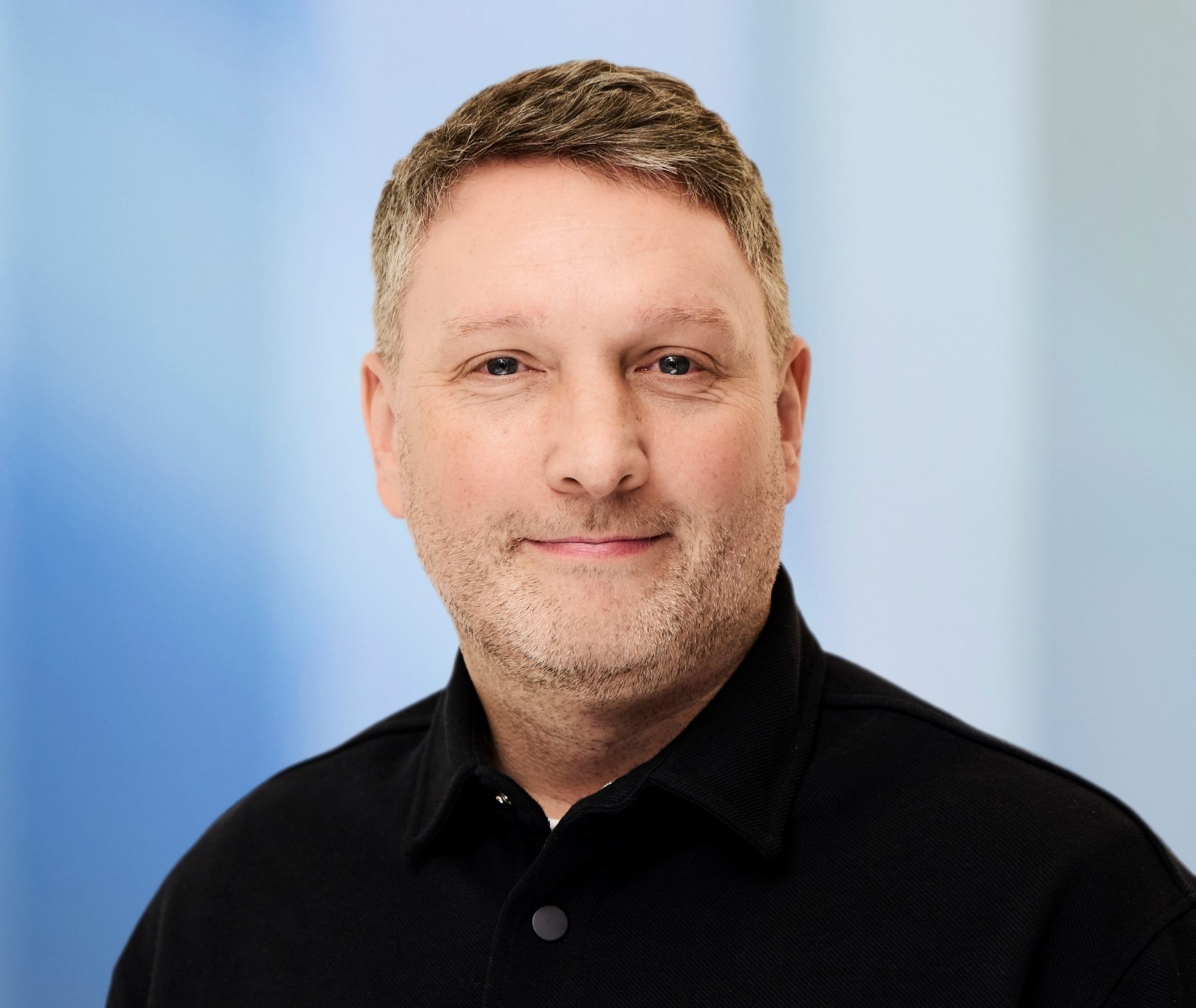 Professional headshot of Graeme Donnell.
