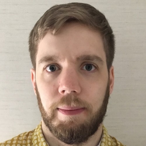 Professional headshot of Matt Greenbank.