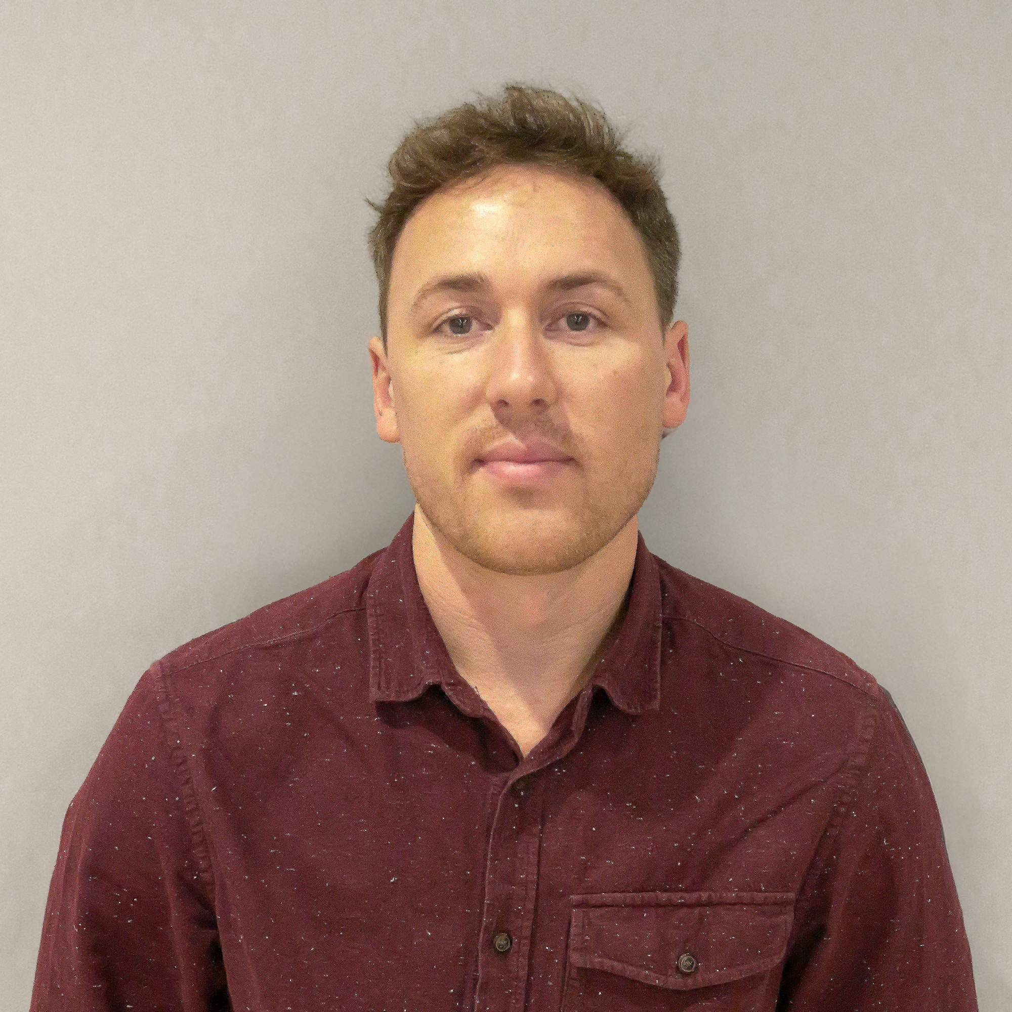 Professional headshot of Matt How.