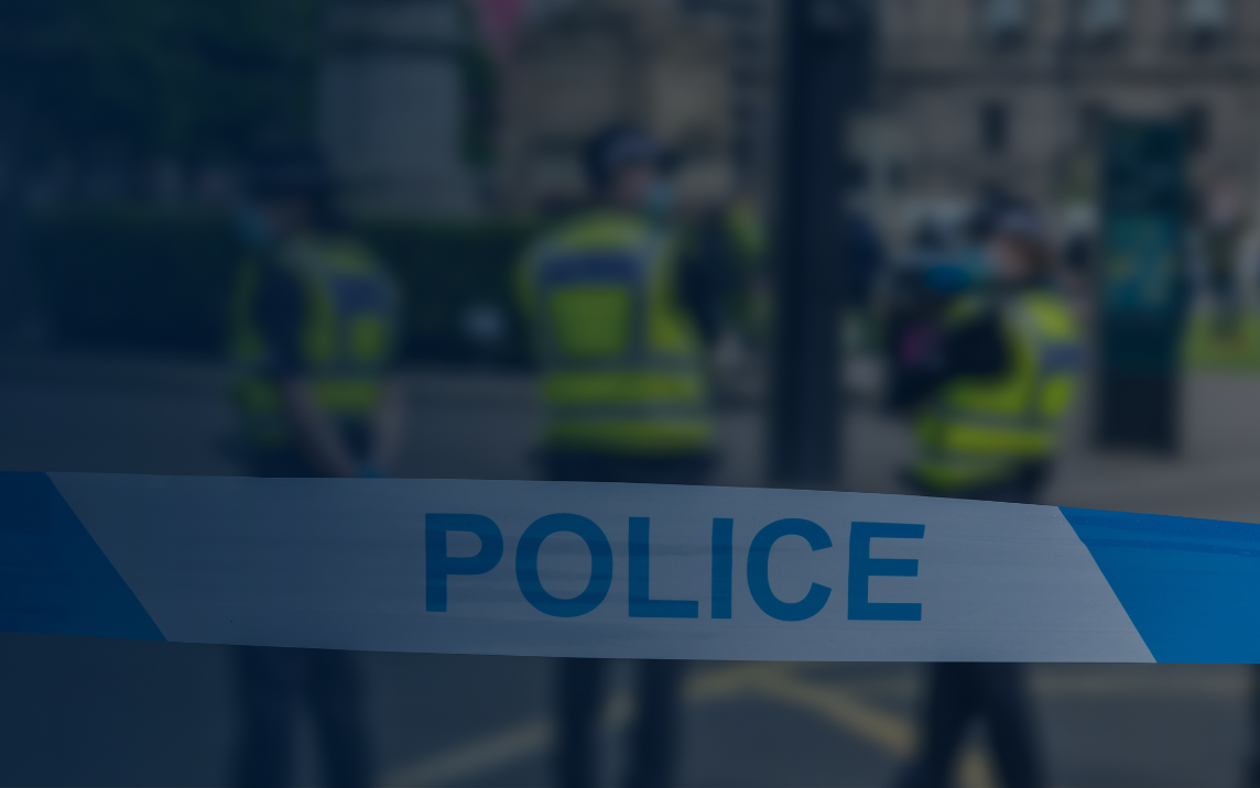 Police line securing an incident scene using policing vision 2030 for situational awareness