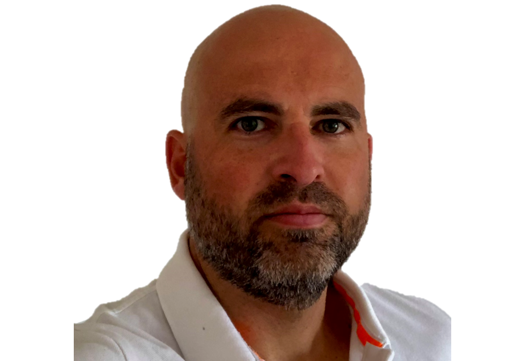 Professional headshot of Roy Behounek.