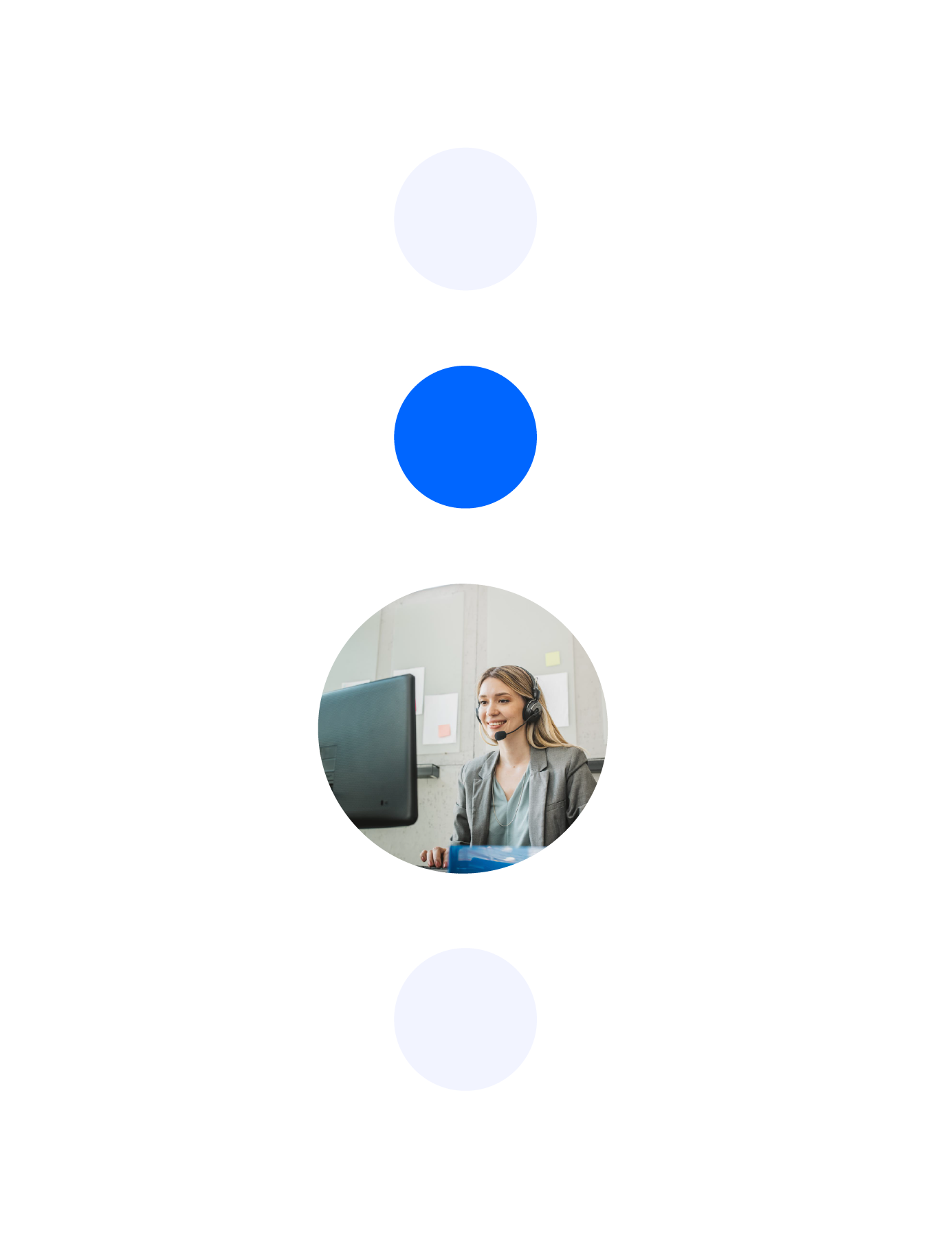 Customer service employee in a contact center, answering a call and using Dynamics 365.
