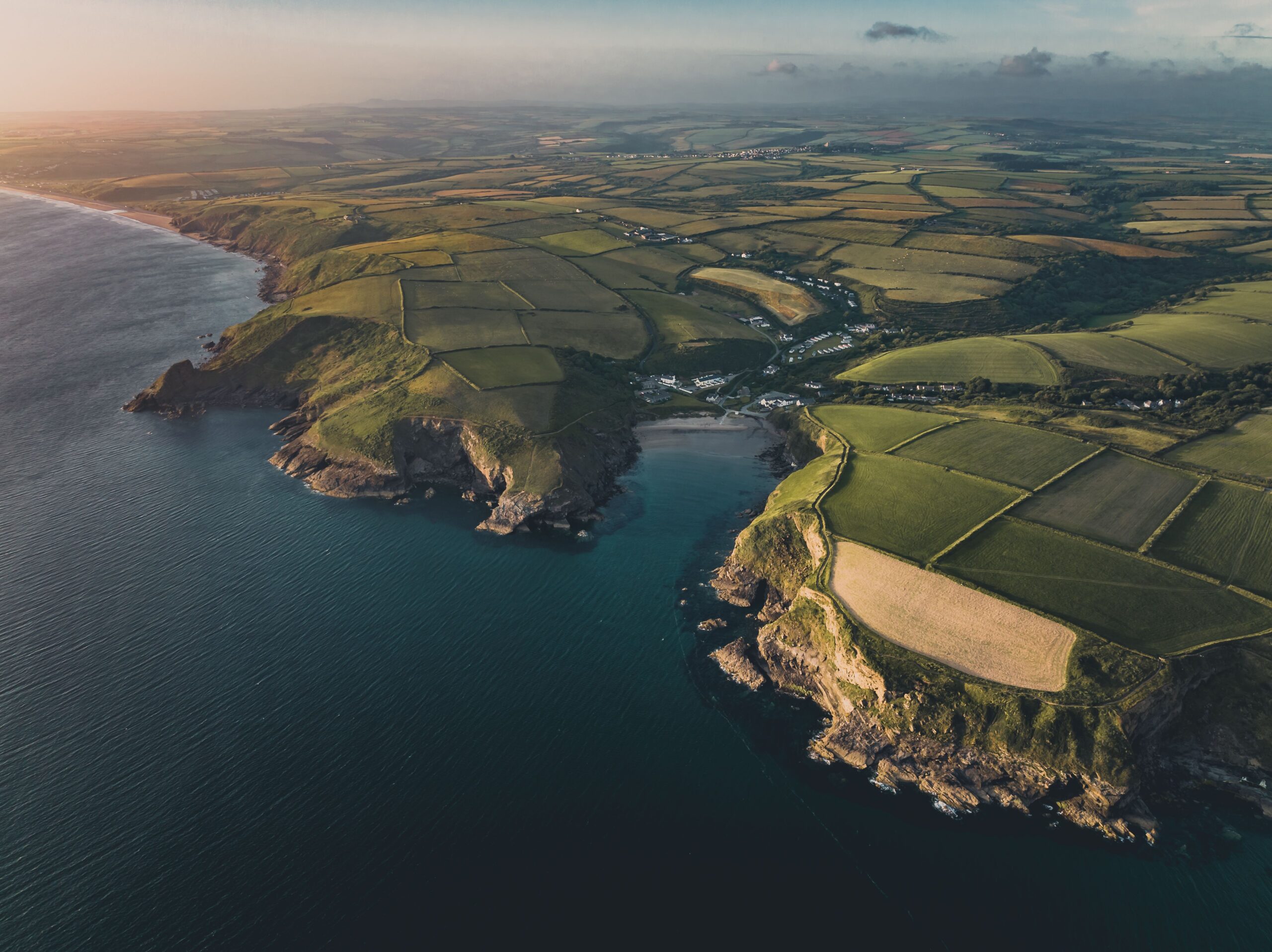 Aerial coastal landscape representing long-term AI strategy development, vision, and transformation roadmap,