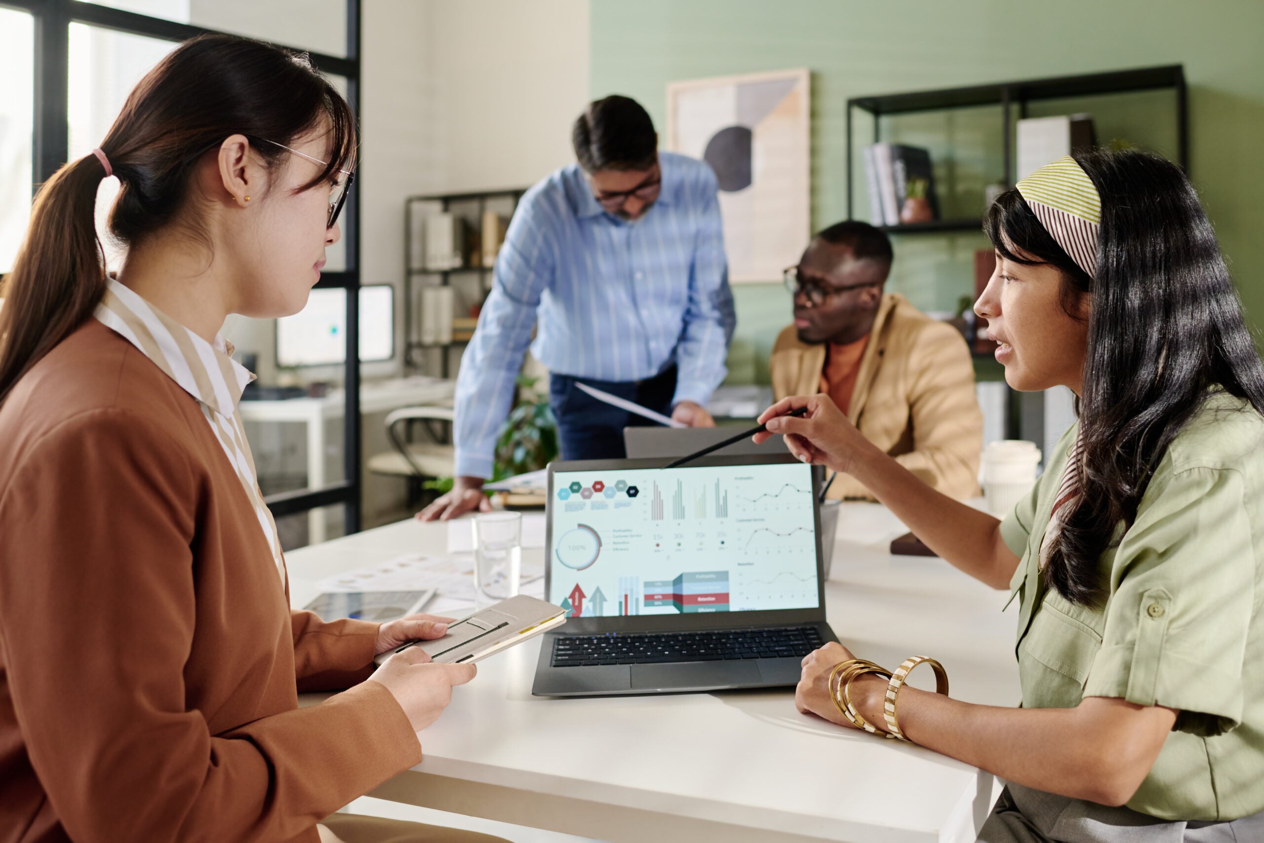 Data professionals collaborating on analytics solutions using Microsoft Fabric