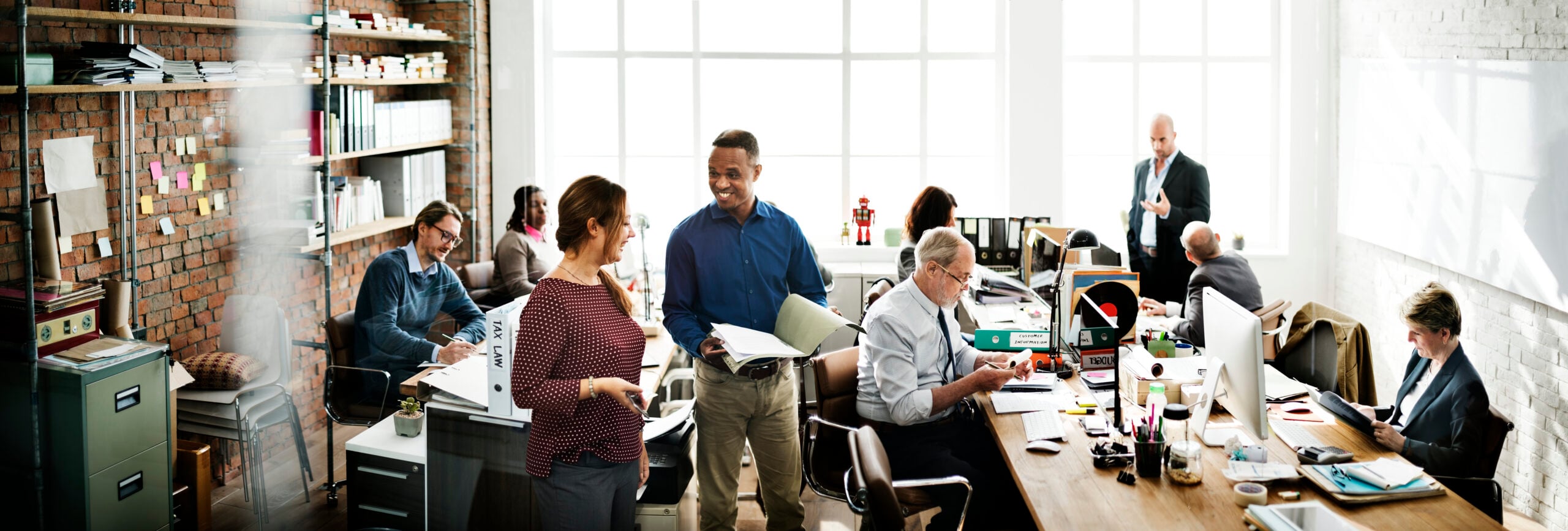 Team of data migration specialists planning a secure enterprise data migration project