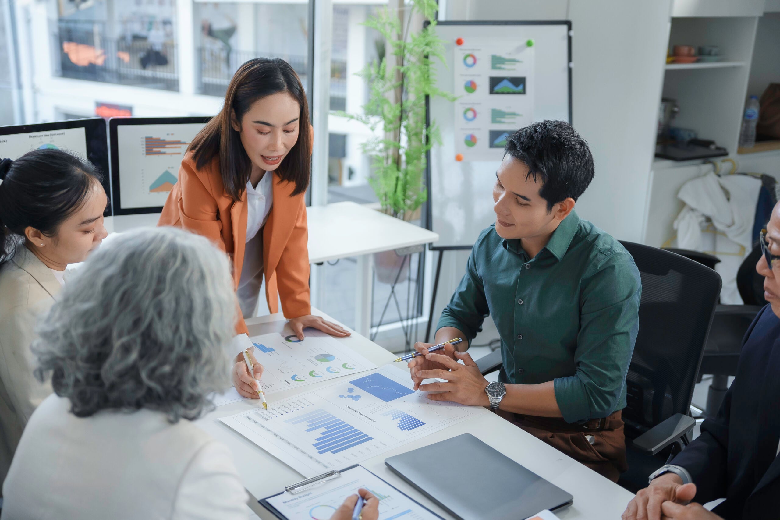 Team collaborating on data and AI strategy in a modern workplace