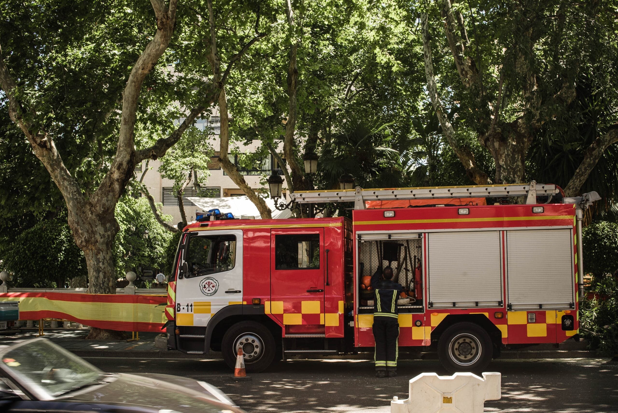 Fire engine and firefighter at an emergency services operation