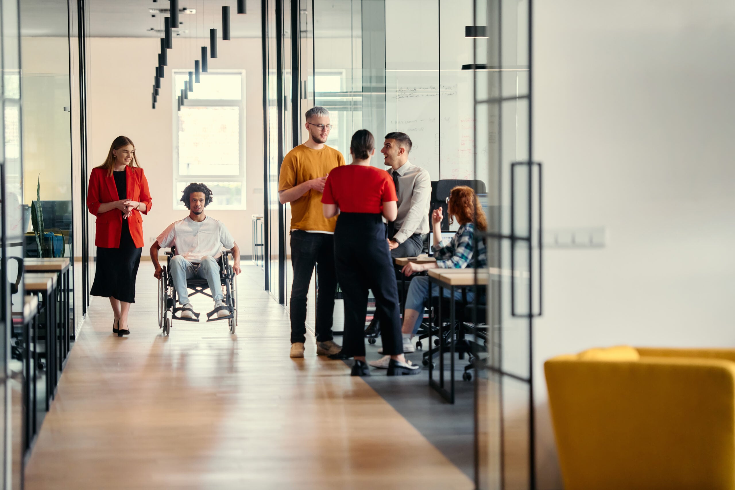Diverse team collaborating on enterprise data governance initiatives in a modern workplace.