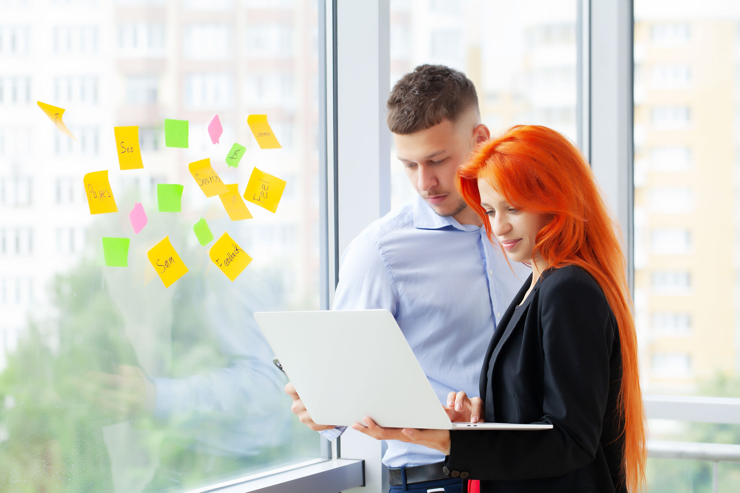 Colleagues using data and analytics to collaborate