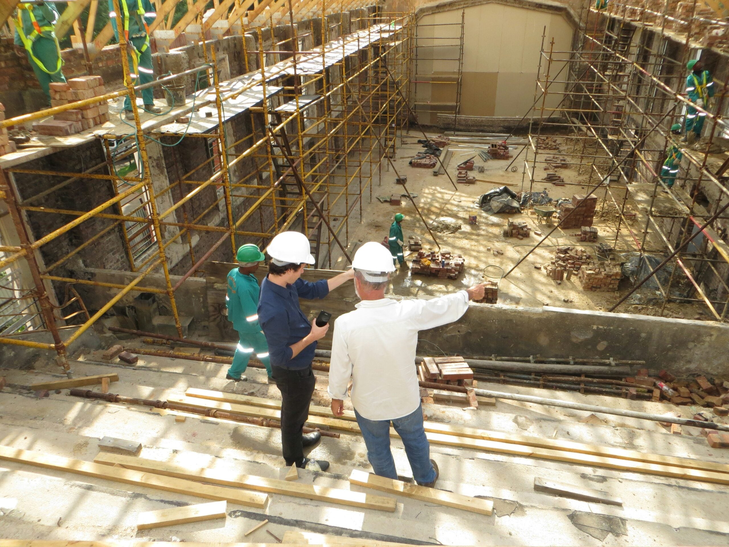 Two men reviewing a construction site