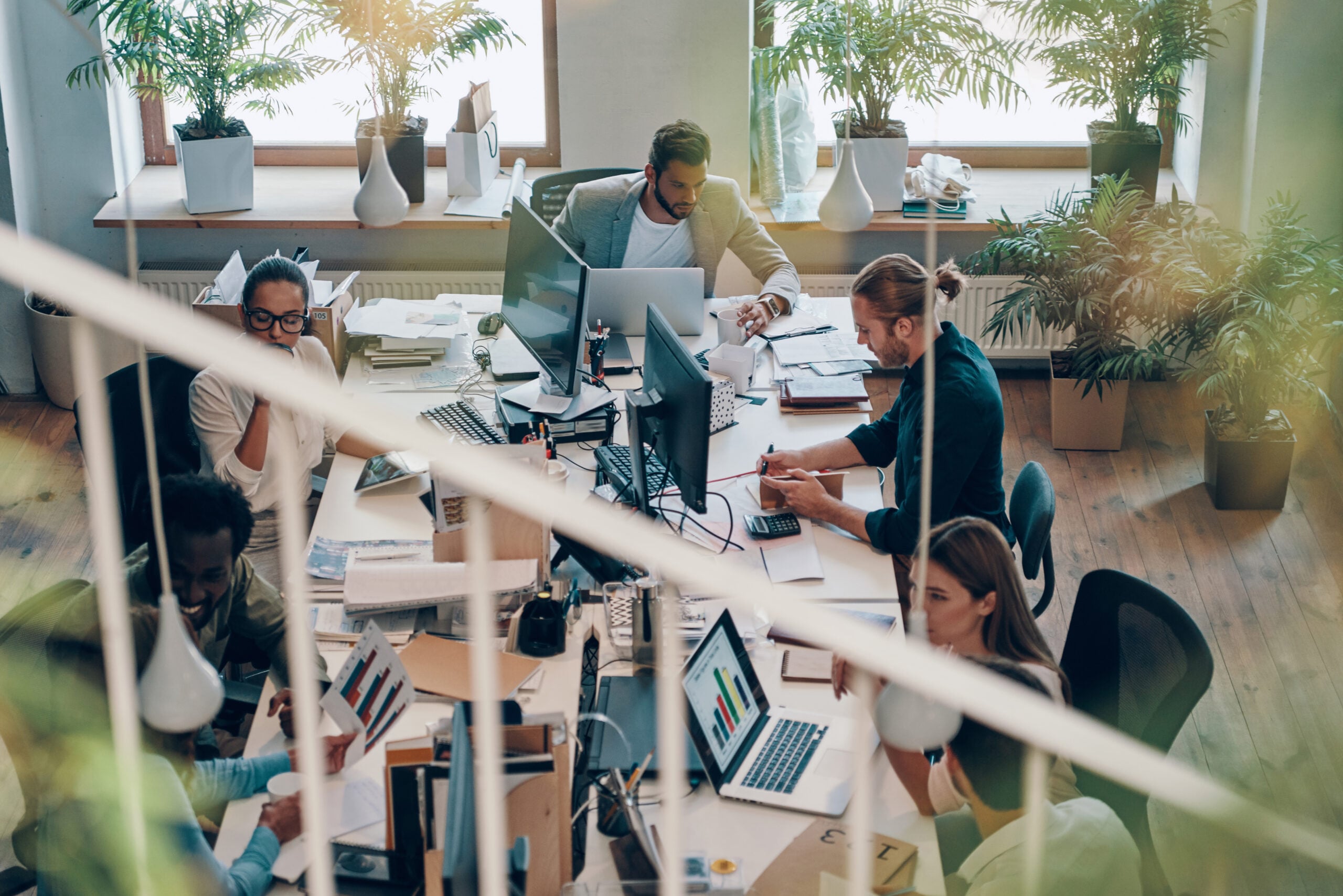 Business team analysing data dashboards and generating insights from analytics platforms