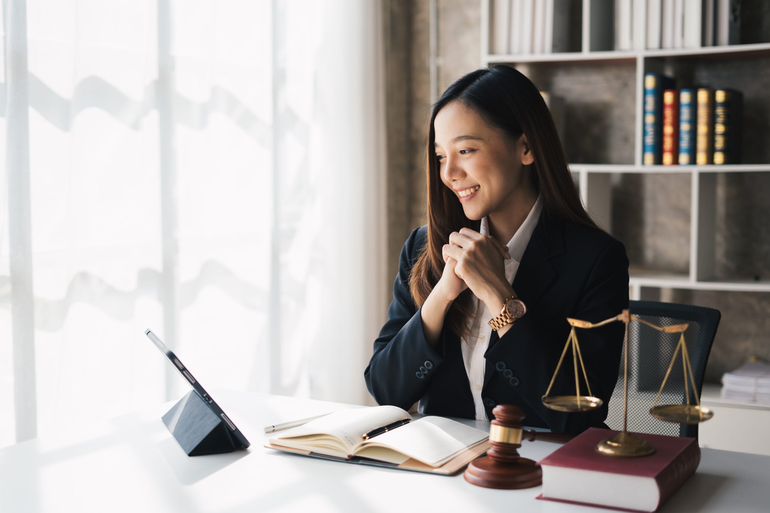 Lawyer reviewing client information using a Single Client View platform to deliver personalised legal services.
