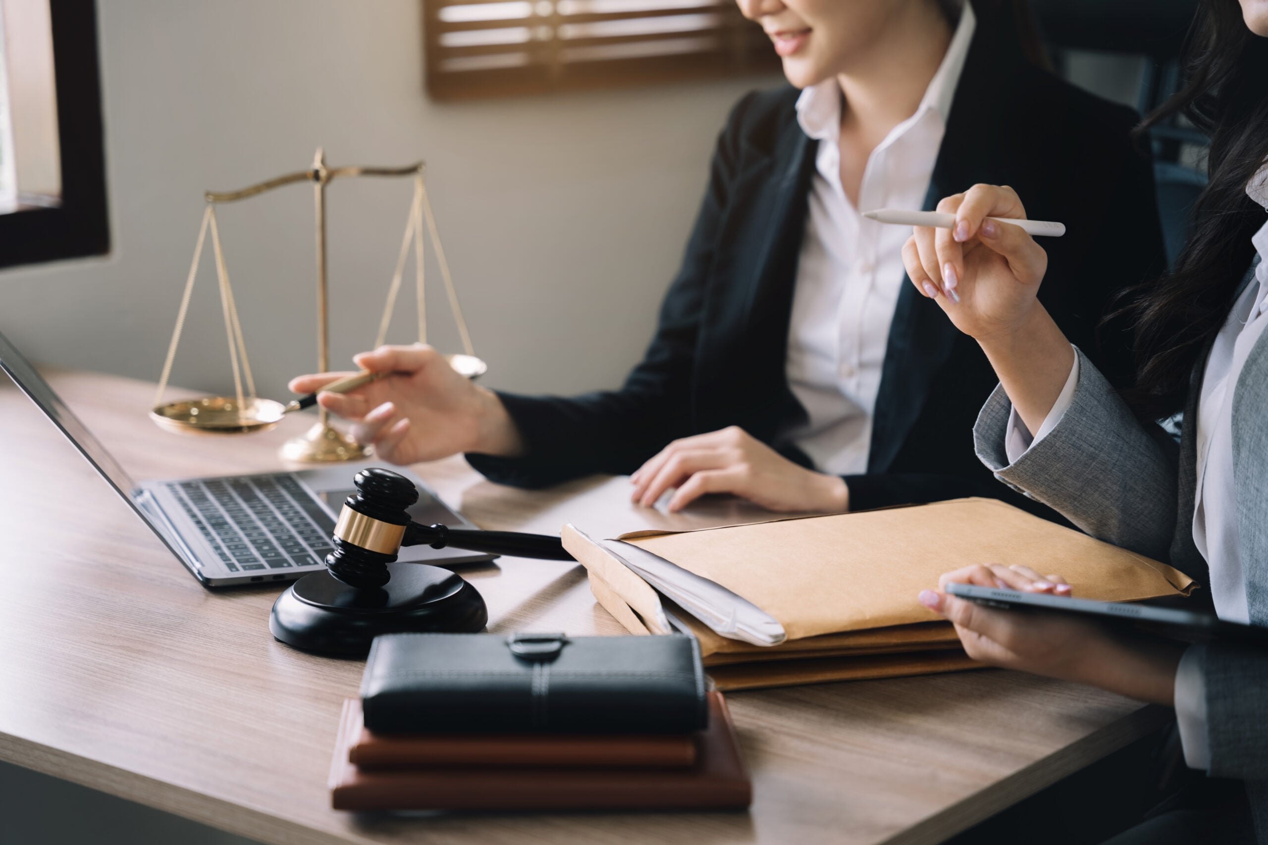 Legal professionals using a Single Client View platform to access complete client information and collaborate on case management.